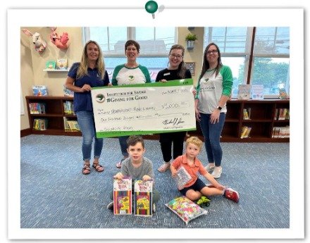 IFS employees give to Childrens' Room at Newburyport Public Library 